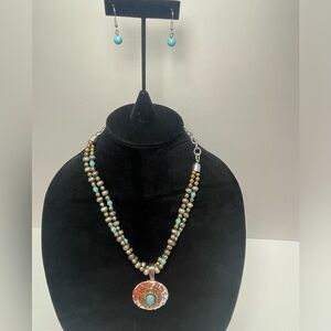Double strand silver & turquoise colored bead necklace with medallion & earrings